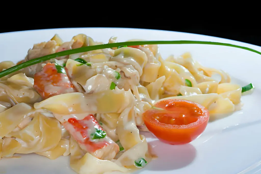 Creamy Pasta with Imitation Crab on a White Plate